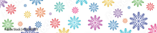 New Year snowflakes on a white background, falling colored snow, Christmas and holiday, fairytale winter