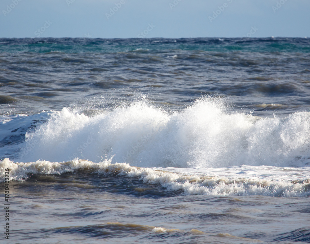 Fototapeta premium The ocean is rough and the waves are high
