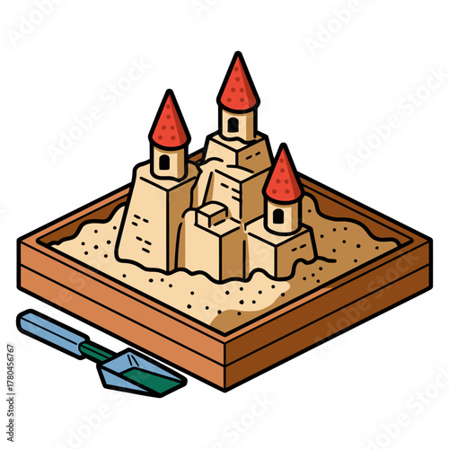 Sandcastle in Sandbox with Shovel

