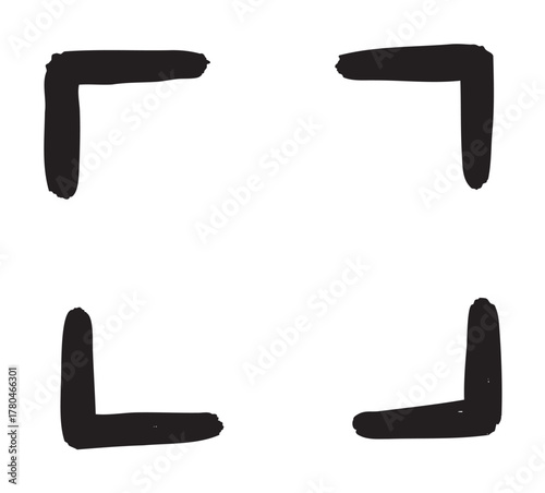 Hand-drawn black corners forming a frame shape with brushstroke texture and thick lines on a white background.
