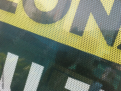 Fotografija Close-up view at One Way Vision sticker film with dot pattern on glass