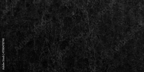 The grunge wall concrete charcoal rough abstract black background. aged urban cement surface wall backdrop texture background.	