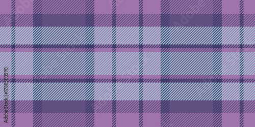 Classic woven plaid pattern in soothing shades of purple. Timeless design for textiles, backgrounds, or packaging. Evokes warmth and heritage.