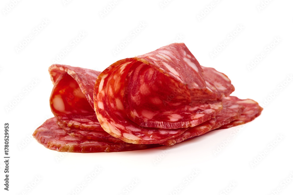 Fototapeta premium Salami slices stack, isolated on white background