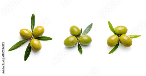Wallpaper Mural green olives with green leaves isolated on white background. Torontodigital.ca