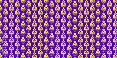 Seamless royal gold paisley floral pattern on deep purple background, luxury Indian ethnic textile motif, traditional ornamental wallpaper, festive wedding decor, elegant rich vintage fabric design