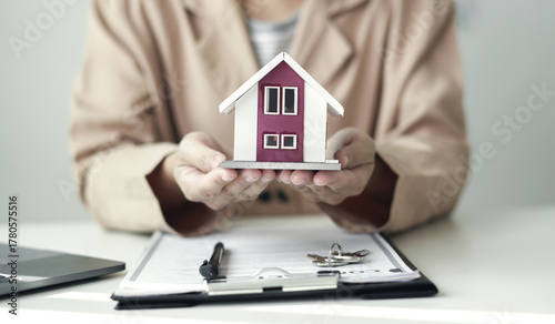 home dealer businessman signing car insurance document or lease paper. home loan and insurance concept