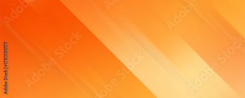 Warm orange yellow red gradient background. Autumn colored blurred wallpaper.