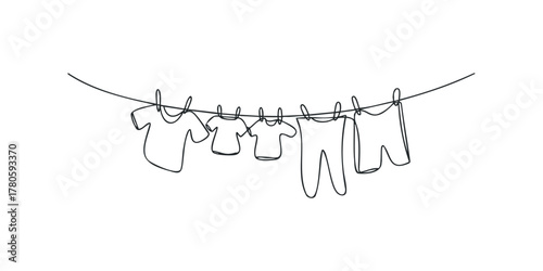 Hand drawn line art of laundry hanging on a clothesline