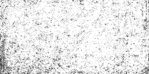 Abstract black and white background with a rough, dirty grunge texture of old cement and wet stone surface