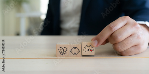 Soft skills and emotional intelligence development in leadership. Wooden blocks with soft skills icons such as empathy, communication, teamwork and emotional intelligence  in workplace.