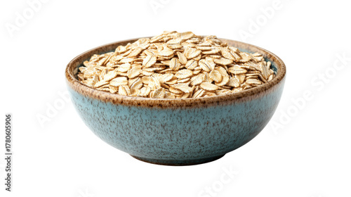 Rolled oats in blue speckled bowl isolated on a transparent background