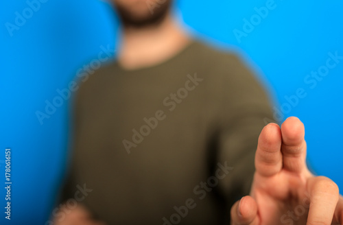 A man's hand outstretched a...