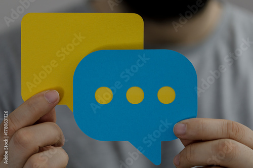 A person holding yellow and...