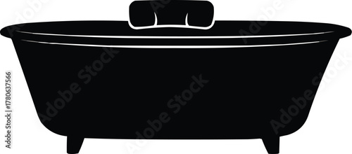 Illustration of a bath pillow on the edge of a freestanding tub, black vector on white
