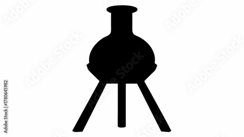 Black silhouette of a round bottom flask on a stand used for chemistry experiments in a laboratory setting