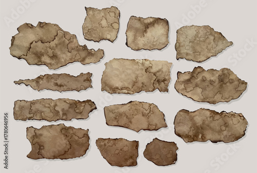 Realistic old Torn Paper Collection with Burn Marks and Texture.Torn aged paper pieces with rough burnt edges and vintage textures