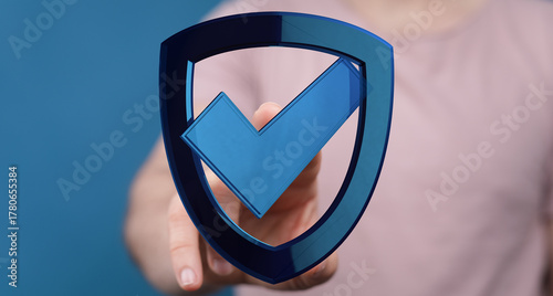 A person holding a shield w...