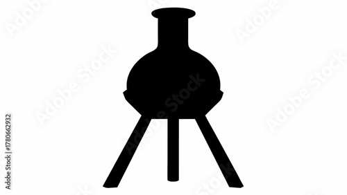 Black silhouette of a round bottom flask on a stand used for chemistry experiments in a laboratory setting