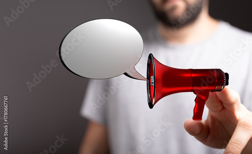 Close up of a man holding a...