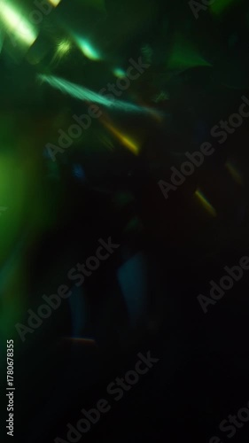 Sun glare, lens flare on a black background for transition to video. Colored rays