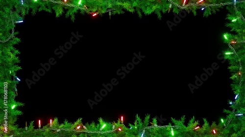 Christmas frame or new year frame with fir or pine leaves and light bulbs blinking. 4K loop animation