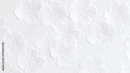 花模様がエンボス加工された白い紙のテクスチャ