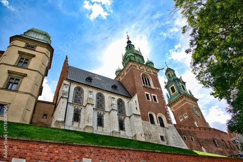 The Royal Castle on Wawel Hill in Poland under a beautiful blue sky.