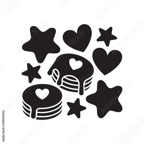 Stack of pancakes with heart shape and stars