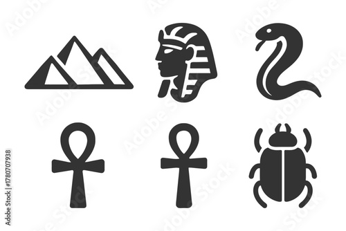 Ancient egyptian symbols: pyramids, pharaonic head, cobra, ankh, scarab.