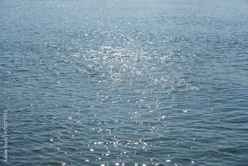 Sea Surface Bokeh with Sunlight Sparkles