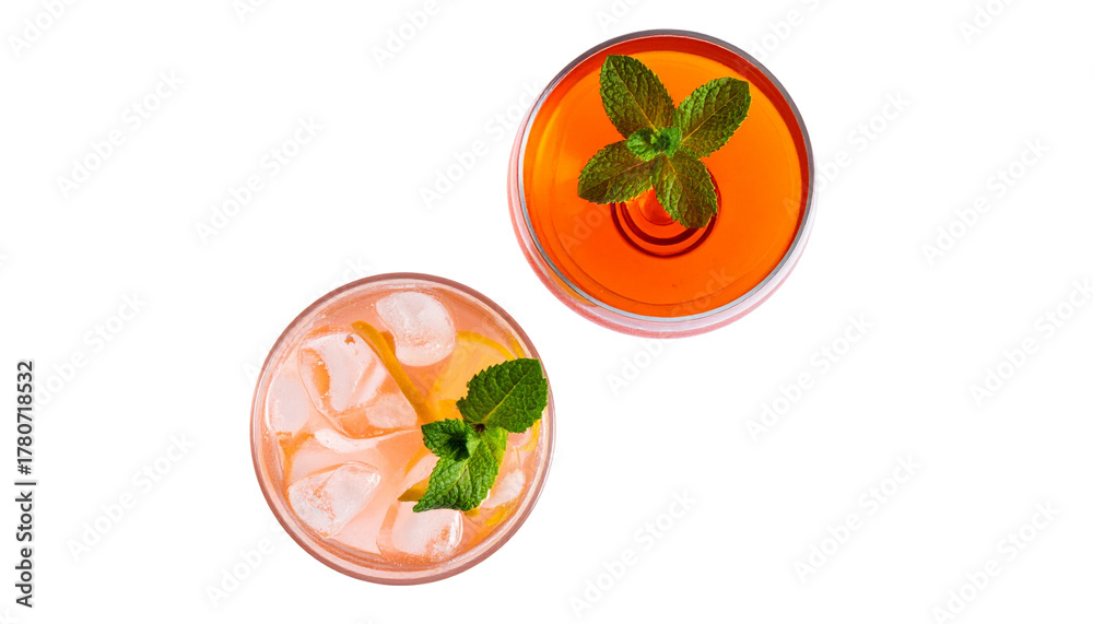 Fototapeta premium Two cocktail variations featuring raspberry martini with mint garnish isolated on transparent background