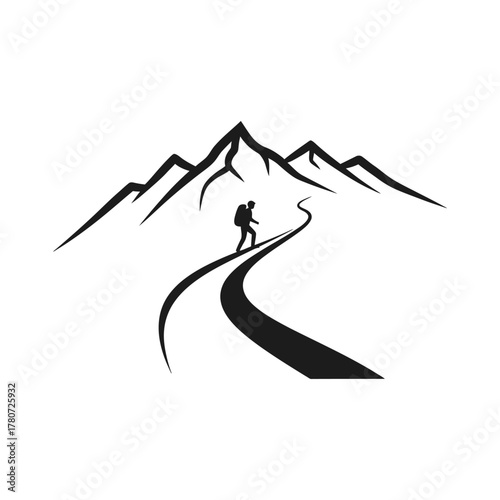 Hiker ascends winding path towards majestic mountain range under clear sky, symbolizing adventure and challenging journey in the wilderness.