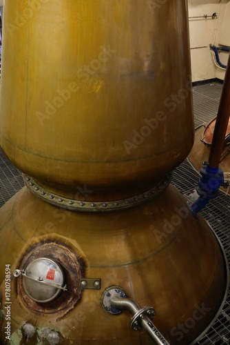 Vintage machinery (pot stills) of the 1794 established Oban Distillery meant for the Highland single malt Scotch whisky production. Oban-Scotland-021