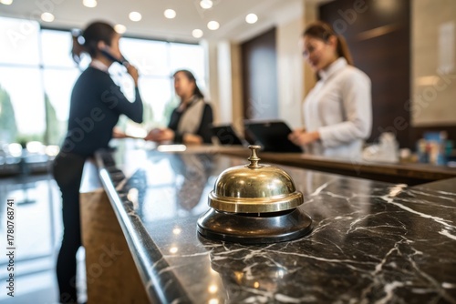 Hotel Reception: Service Bell and Staff