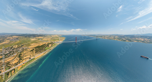 Wallpaper Mural Lapseki, Turkey. Panoramic aerial view of 1915 Canakkale Bridge over Dardanelles Strait with cargo ship passing below on summer day. Aerial view Torontodigital.ca