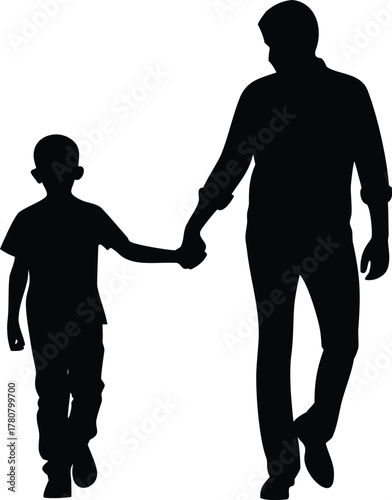Silhouette of father and son walking together
