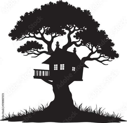 Black silhouette of a treehouse with a large tree and grass