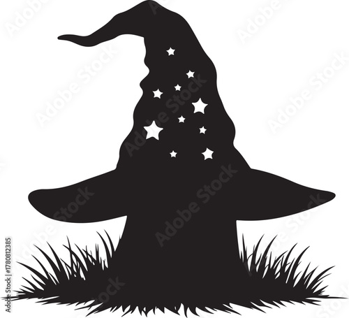 Black silhouette of a wizard hat with stars on grass