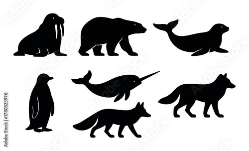 Silhouettes of arctic and antarctic animals: walrus, bear, seal, penguin, narwhal, wolf