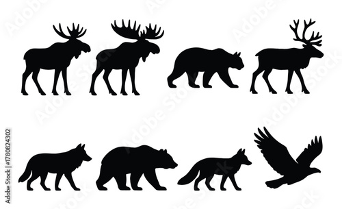 Silhouette wildlife: moose, bear, elk, wolf, fox, eagle on dark background