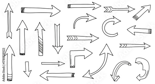 Collection of hand drawn arrow doodles and directional pointers in black ink on a white background