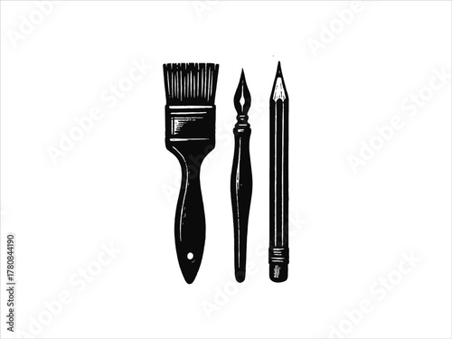 Vintage art studio tools paint brush, ink pen, pencil arranged flatlay