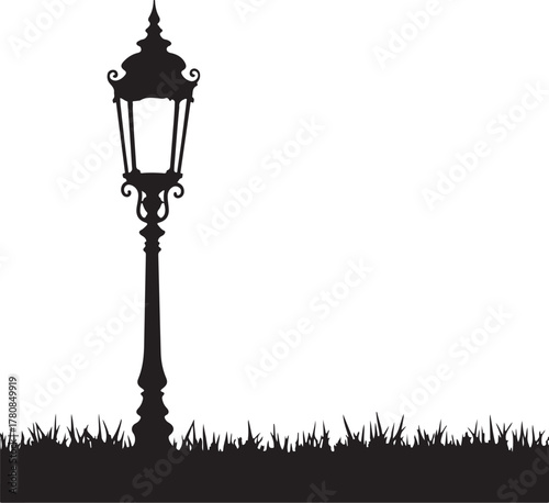 Black silhouette of ornate street lamp on grass white