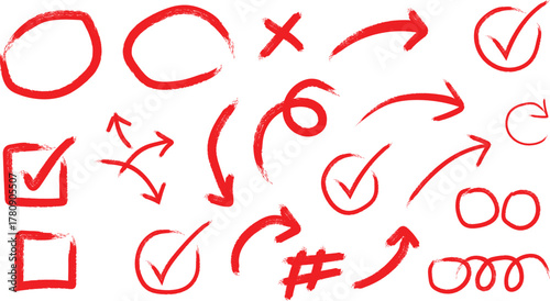 Collection of hand drawn red marks including checkmarks circles arrows and x symbols for editing