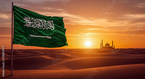 Fototapeta Naklejka Na Ścianę i Meble -  Saudi Flag and Desert Mosque at Sunset
