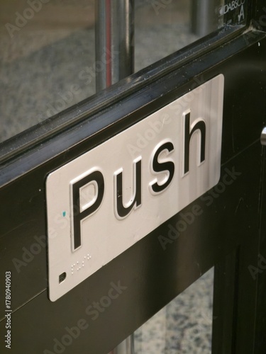 Close-up of a Push Sign on Door