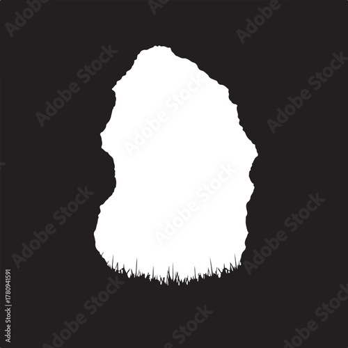 White silhouette of a cave entrance with grass opening