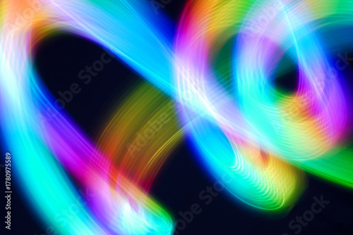 Abstract irregular blue ,red ,neon lights on black background. Long exposure. Light painting photography  
