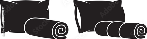 Two black pillows and rolled blankets silhouette isolated on white background